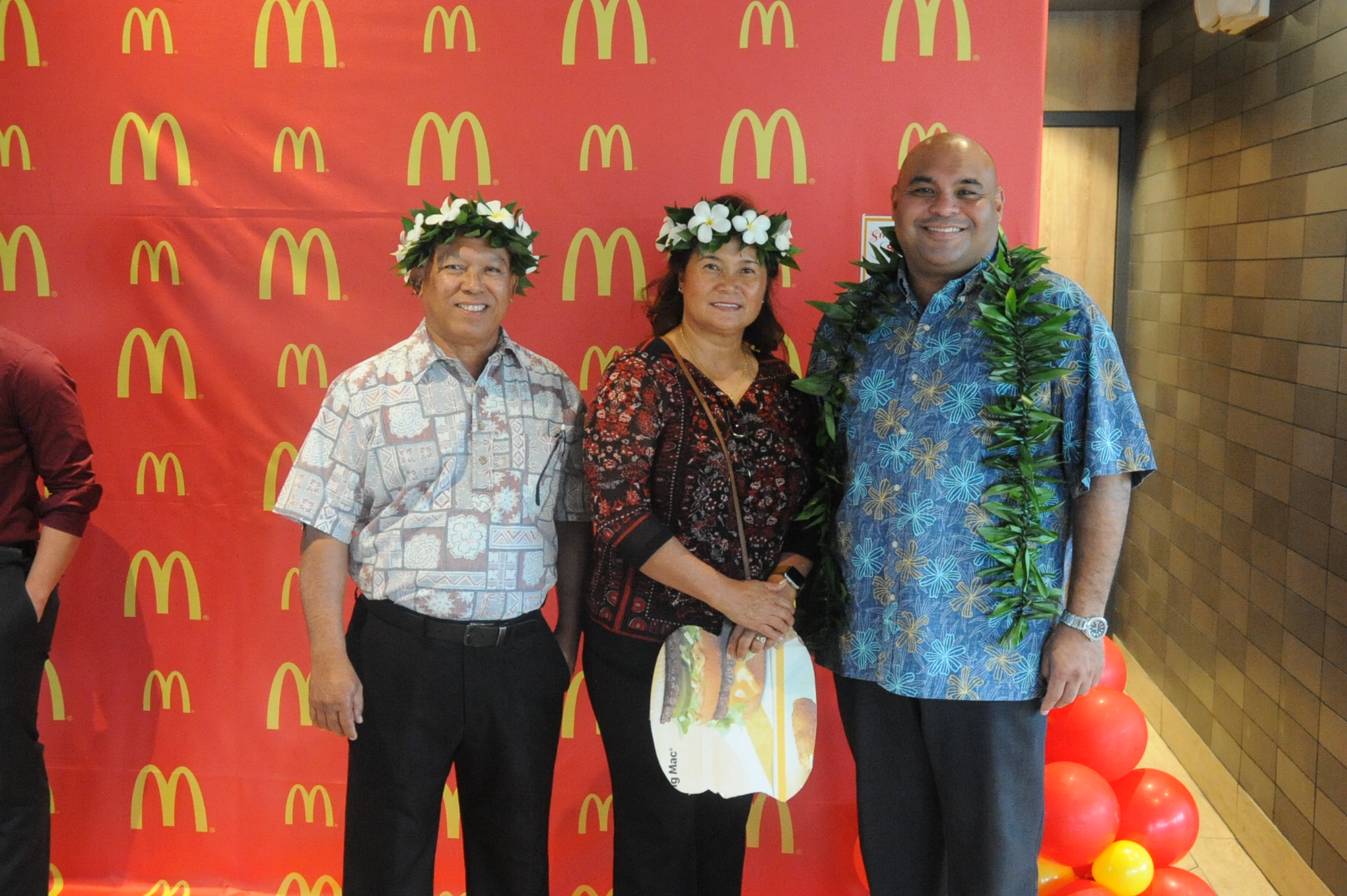 (From left) Marcia E. Ayuyu and Joe C. Ayuyu, co-franchisees of JCA Guam LLC; and Lt. Governor Joshua F. Tenorio.